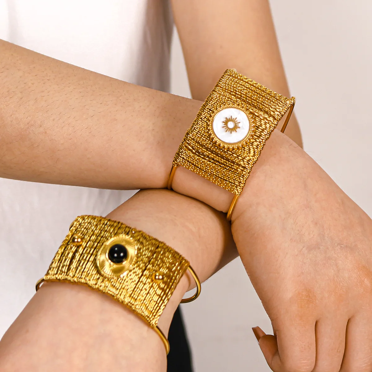 Wide gold-tone cuff bracelet with natural stone centerpiece, Alkimia Charms jewelry