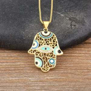 Unisex gold-tone hollow heart pendant with Hamsa hand and Evil Eye symbol, Alkimia Charms jewelry