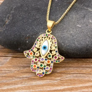 Gold-tone CZ necklace with Hamsa Hand and Turkish Evil Eye charms, Alkimia Charms jewelry
